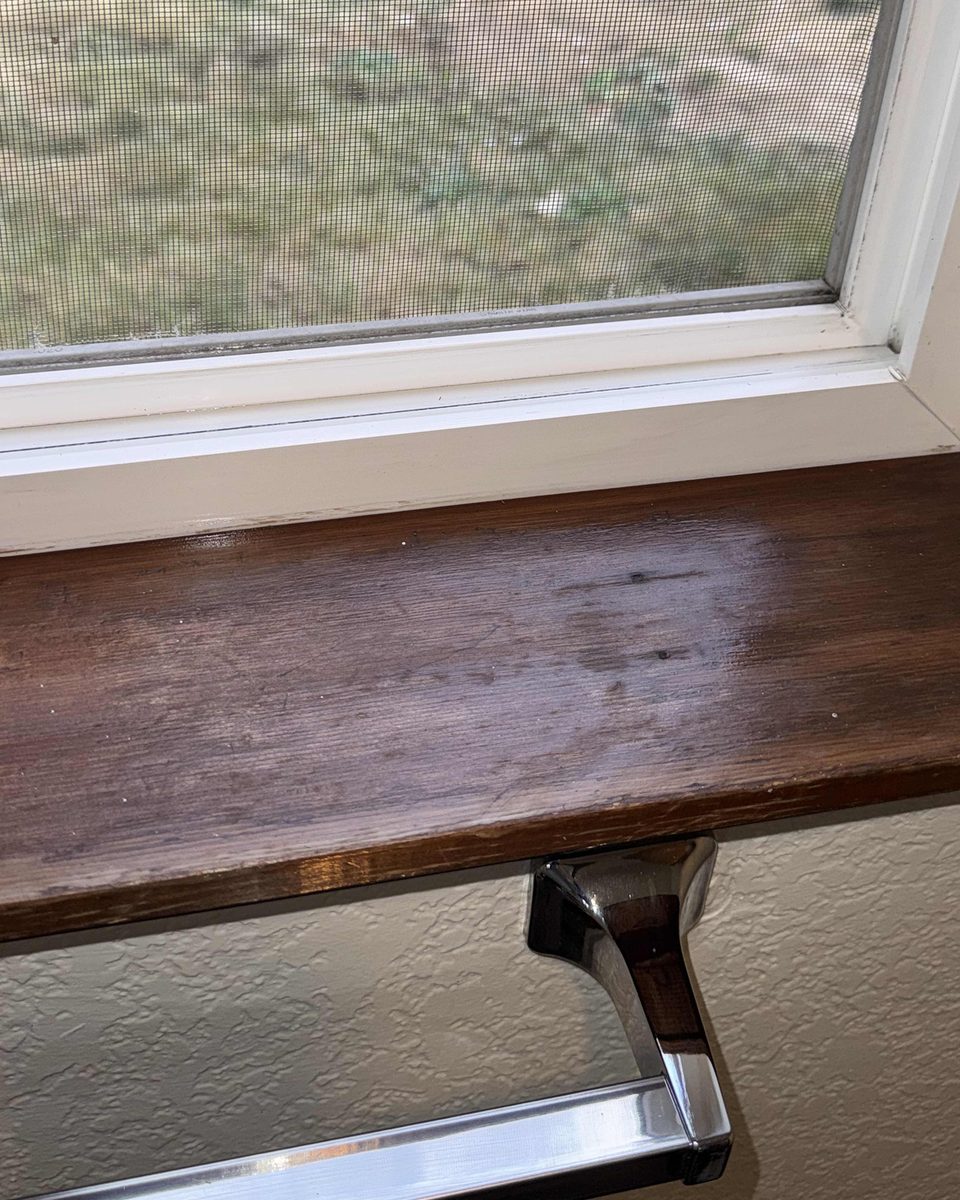 Window sill & screen — after cleaning