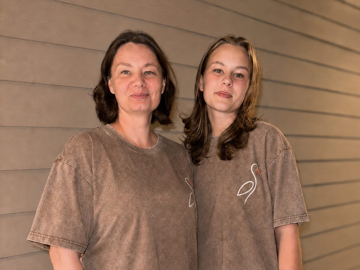 The Leleka Home Cleaning family team in branded stork T-shirts, Everett, WA